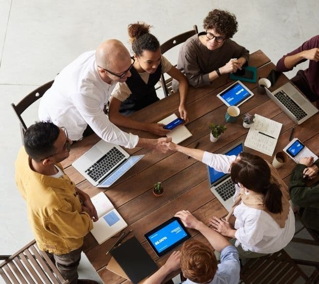 Team collaborating around a table
